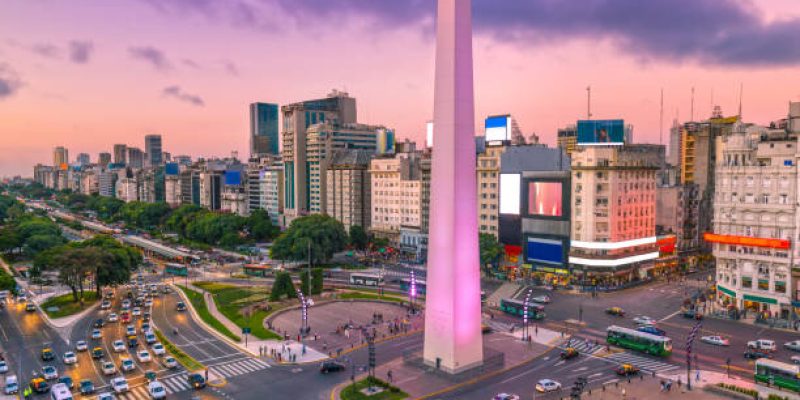 Plaza de la Republica in the centre of Buenos Aires with the Obelisco, one of the main symbols of the capital of Argentina at dawn with heavy traffic